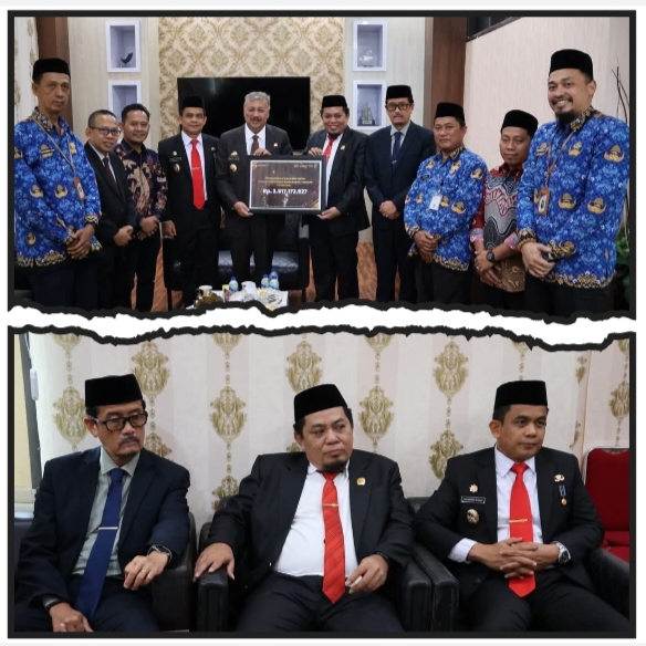 Bupati Pinrang Terima Dana Hibah Yang Diserahkan Ketua KPU Pinrang